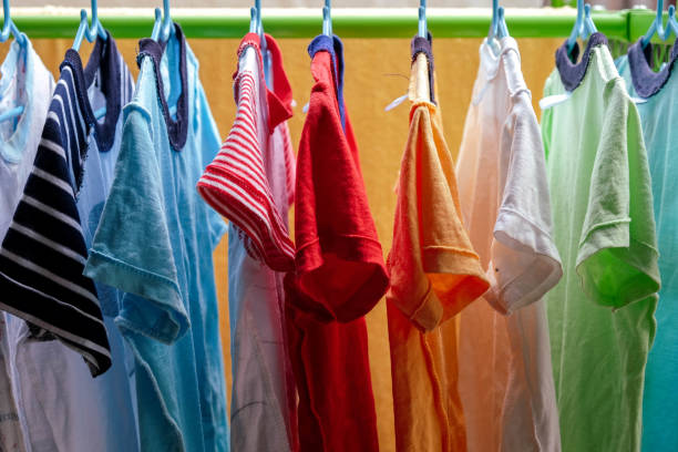istock dry colorful clothes in the sun 947319430