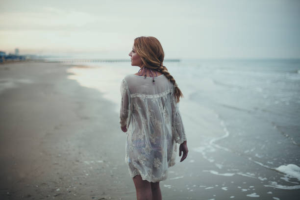 Dreamy girl on beach