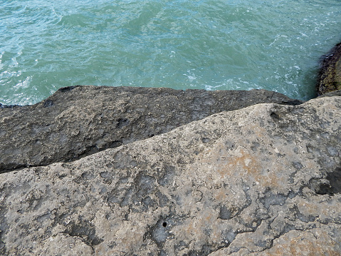 Rocky shore of the Caspian Sea. The texture of the stone.