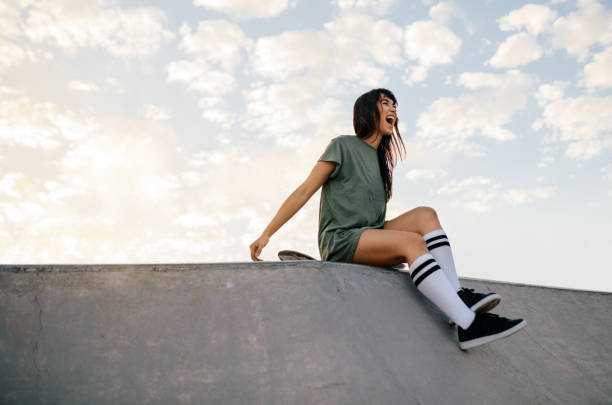 istock Woman enjoying a day at skate park 947323482