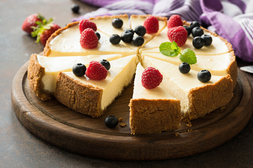 Summer berry cheesecake cut into slices