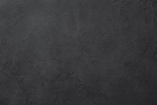 Black slate or stone texture background