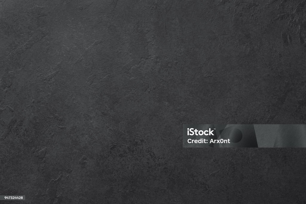 Black slate or stone texture background Black slate or stone texture background, horizontal Backgrounds Stock Photo