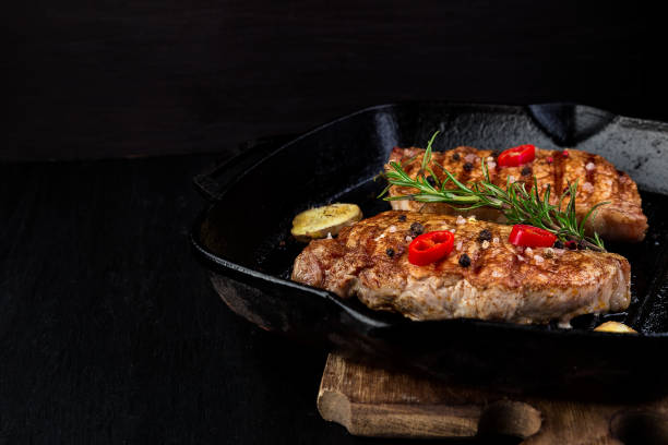 istock Grilled pork steak in grill pan 947330538