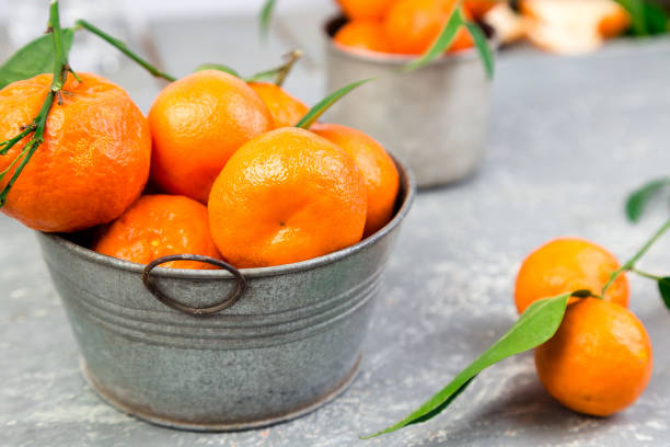 istock Tangerines background. Delicious and beautiful Citrus. 947331038