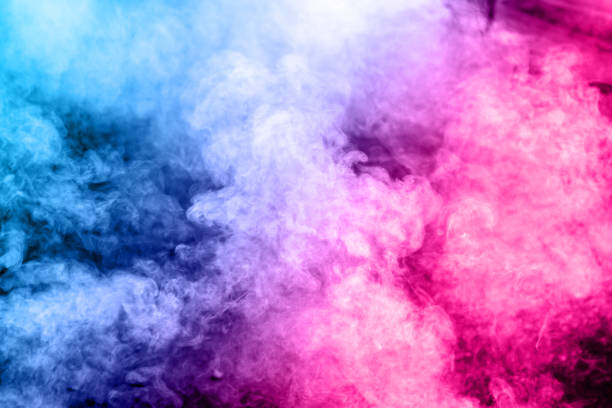 istock Abstract multicolored smoke on background. Abstract bright colorful smoke on background. Color smog clouds. 947334988