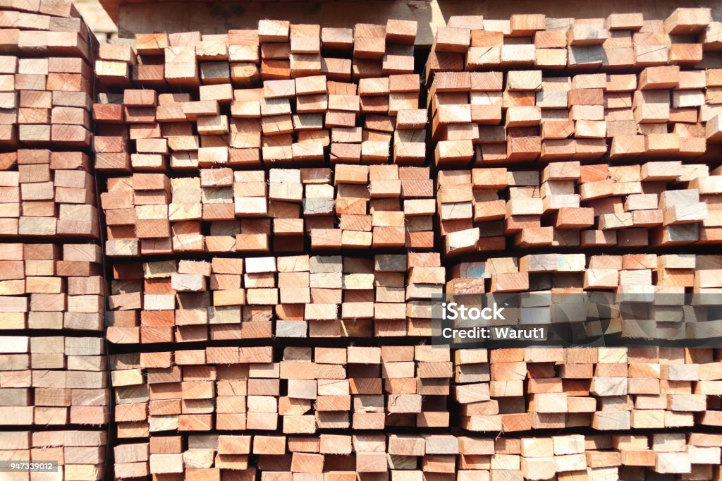 Stack of square rubber wood Stack of square rubber wood for furniture industry Backgrounds Stock Photo