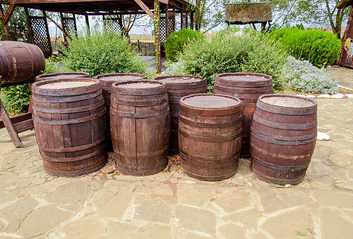 Stacked wine barrels. Decoration of the barrels in the village Ataman