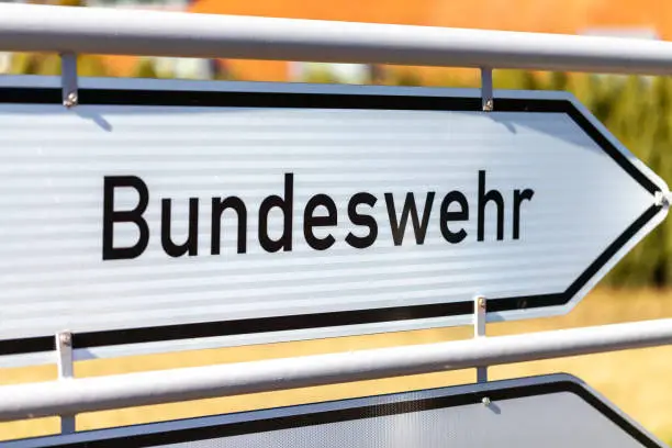 Photo of german Bundeswehr sign near a barrack. Bundeswehr means German armed forces