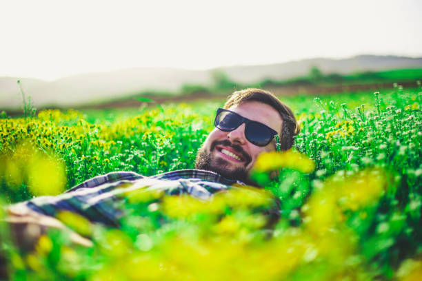 istock Handsome man is smiling in the countryside 947343694