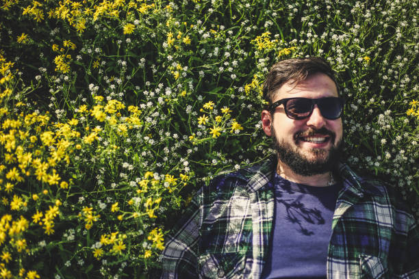 istock Handsome man is smiling in the countryside 947343810
