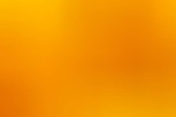 istock Abstract blur background orange and yellow gradient color 947345072