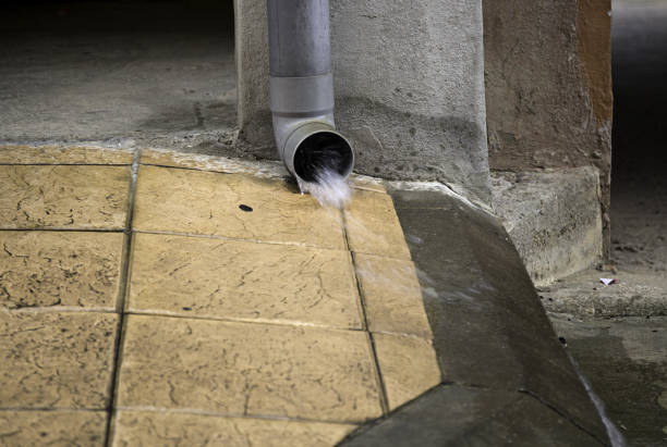 istock Drainpipe in street 947348360