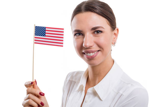 istock Handsome girl with USA flag 947348740