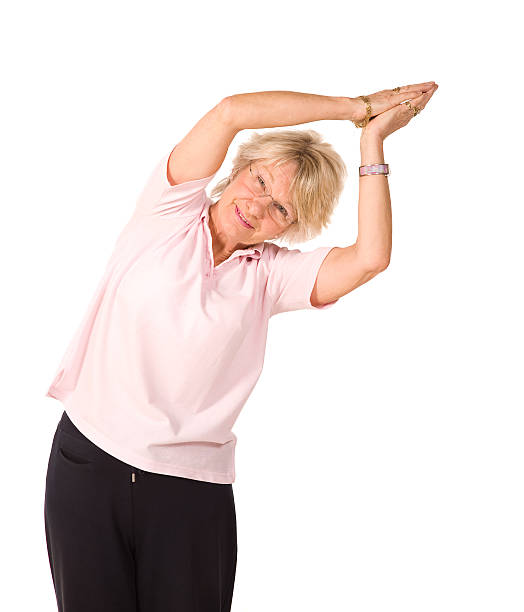 istock Mature woman stretching 94735308