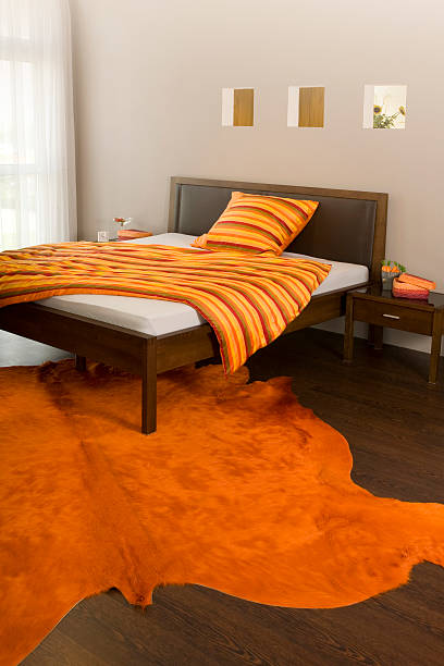 Fancy bedroom with orange fur  sleeping cow stock pictures, royalty-free photos & images