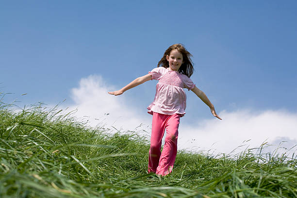 istock Girl running in the meadow 94736094