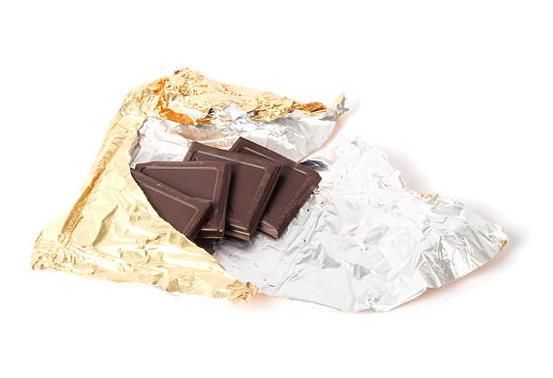 istock square pieces of chocolate bar in foil wrap 94736286