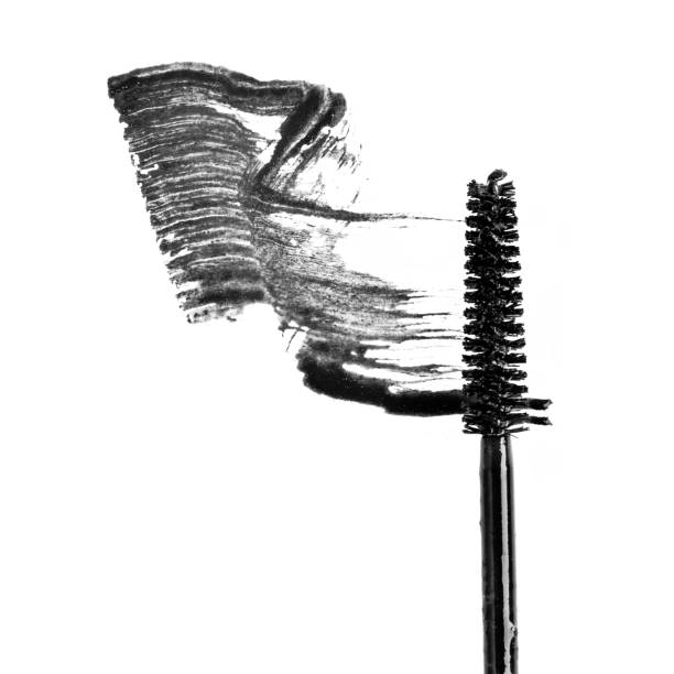 Mascara Smudge Mascara smudge and applicator on a white background. mascara wands stock pictures, royalty-free photos & images