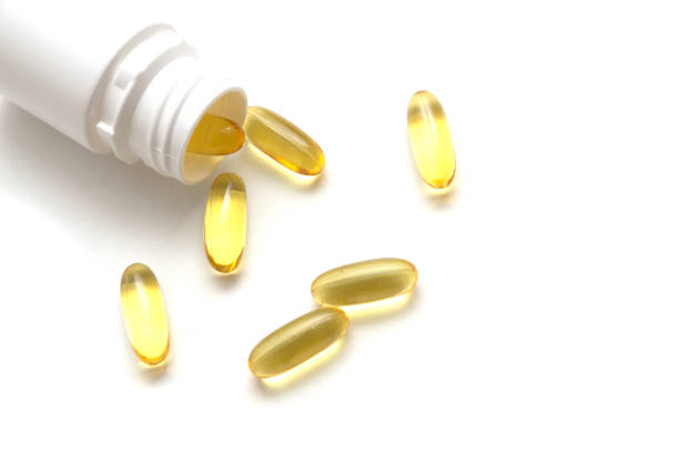 istock Pill and pill bottle on white background :medical concept 947367782
