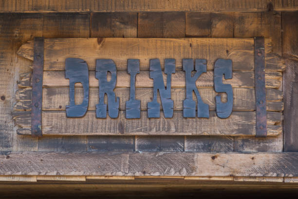 istock Drink Insignia, Text Symbol on Wooden Planks 947373568