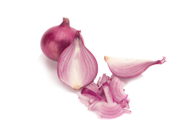 istock Red sliced onion isolated on white background 947376784