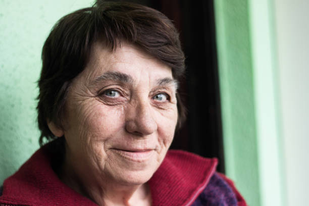 istock Senior woman smiling 947381612