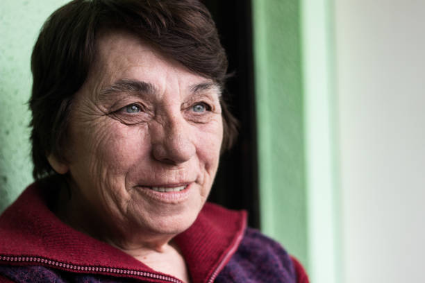 istock Senior woman smiling 947381724