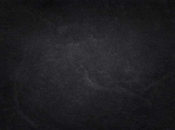 istock Dark grey black slate texture in natural pattern with high resolution for background and design art work. Black stone wall. 947382658