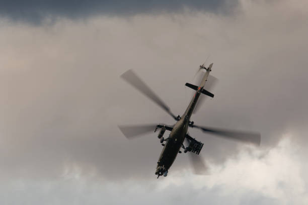 istock Military helicopter in the sky 947389384