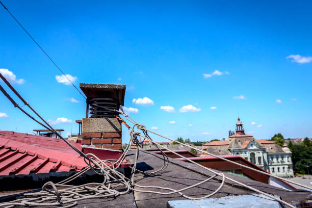 istock Industrial climbers are bounded their ropes to the chimney 947392452