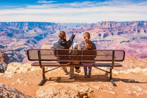 Photo of Family looking at view Grand Canyon National Park USA