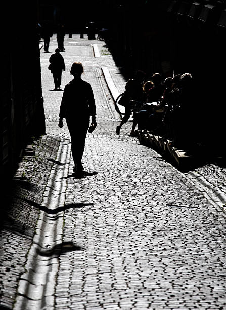 istock silhouettes on street 94740247