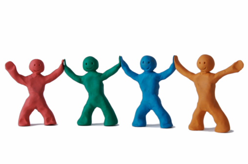 Plasticine people on a white background.