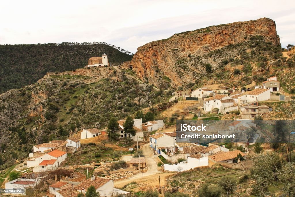 Views of the town of Villa de Ves between mountains and the Sactuary. Views of the town of Villa de Ves between mountains and on top of the Sanctuary. Community of Castilla La Mancha, Albacete, Spain. Albacete Province Stock Photo