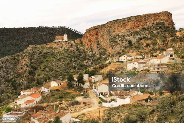 Views Of The Town Of Villa De Ves Between Mountains And The Sactuary Stock Photo - Download Image Now