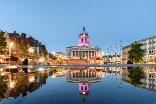 Nottingham City hall Nottingham Council House and a fountain front shot at Twilight market square stock pictures, royalty-free photos & images