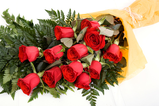 High angle view of a dozen red roses; great for a variety of special occassions; copy space 