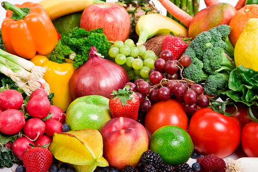 Large collection of fruits, vegetables, berries isolated on white background.