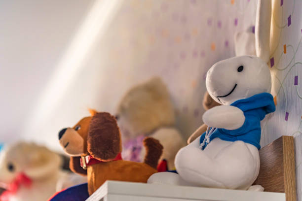 istock Children's soft toys on shelf 947431670