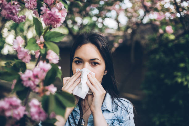 istock Woman blowing nose 947434406