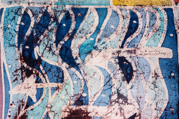 istock Waves and arrows, hot batik, background texture, handmade on silk 947435956
