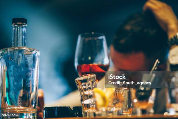 Man Drinking Alone Stock Photo - Download Image Now - Binge Drinking,  Liqueur, Addict - iStock