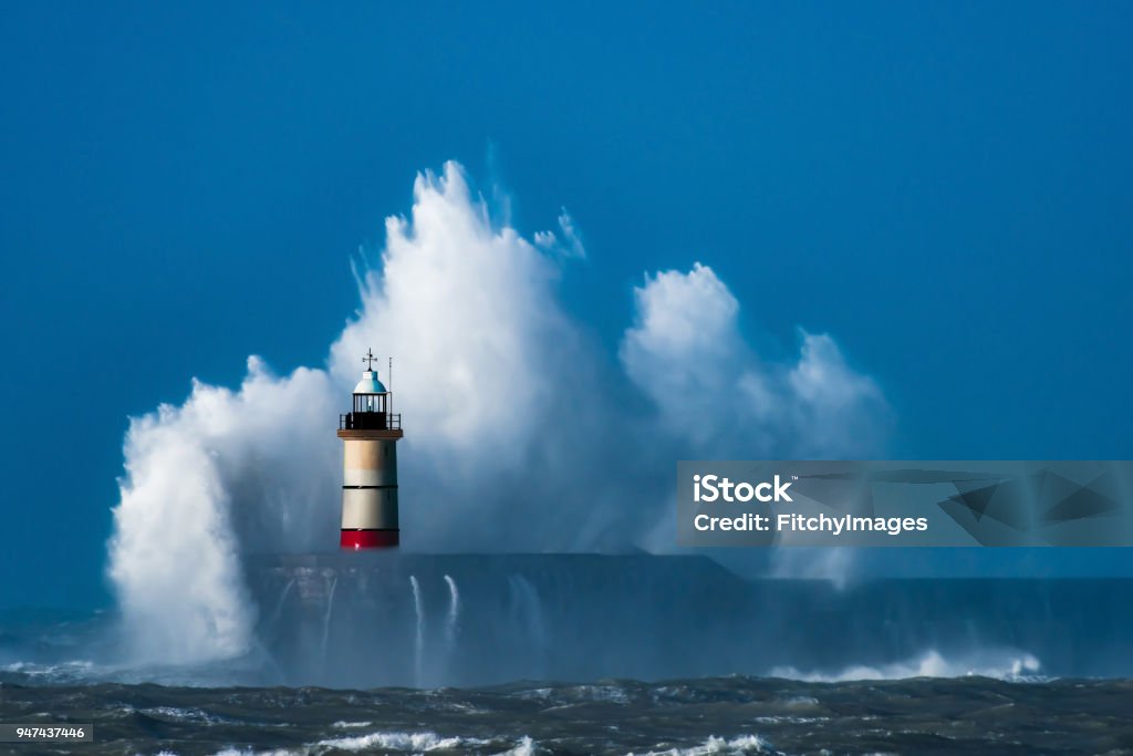 Perfect Storm Lighthouse - Storm - Huge waves -Sea defence - Harbour - Storm - English Channel - East Sussex - Newhaven - UK Lighthouse Stock Photo