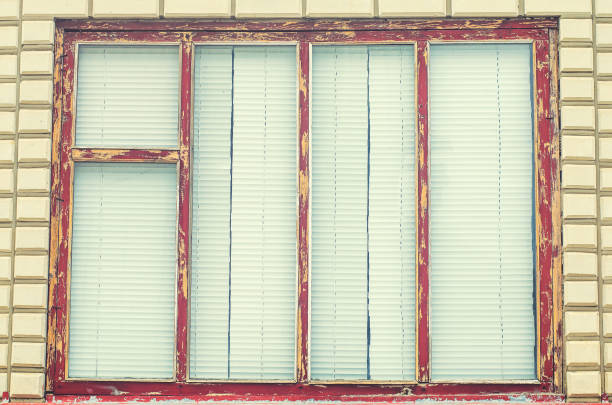 old windows with jalousie in the village