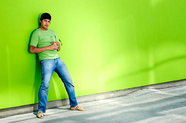 Young Man Against Lime Green Wallhttp://www.erichoodphoto.com/istock/lifestyles.jpg
