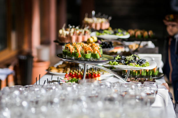 istock holiday buffet table served by different canape, sandwiches, snacks ready for eating in restaurant 947465636