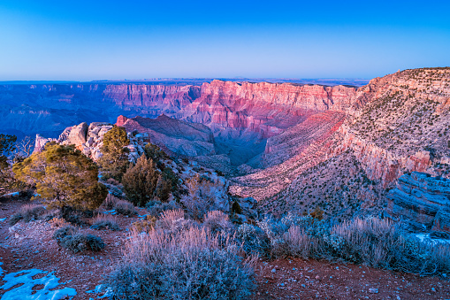 Stock photograph of Grand Canyon National Park USA at Lipan Point, during twilight alpenglow.