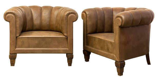 istock Art deco styled brown vintage armchairs isolated on white 947467180