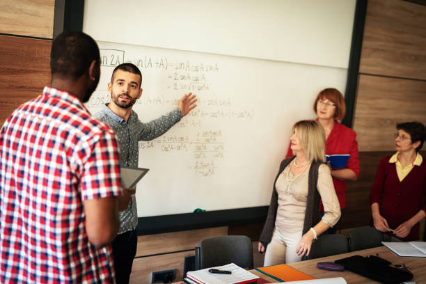 istock Adult students learning new approaches in education 947472126